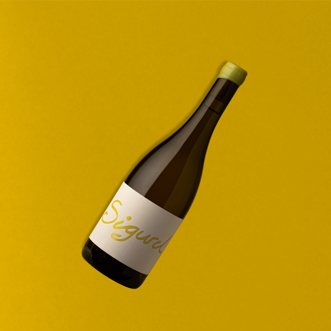 A bottle of 2022 White Blend wine with a label that reads 'Sigurd' placed on a yellow background.